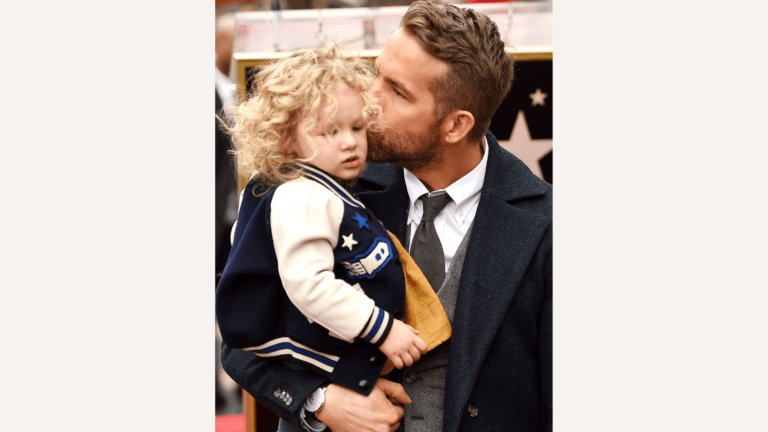 Ryan Reynolds kissing young daughter at Hollywood Walk of Fame star ceremony