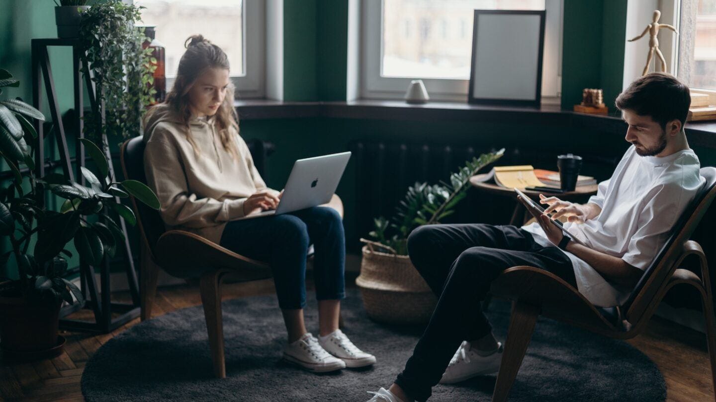 couple working together at a coffee shop