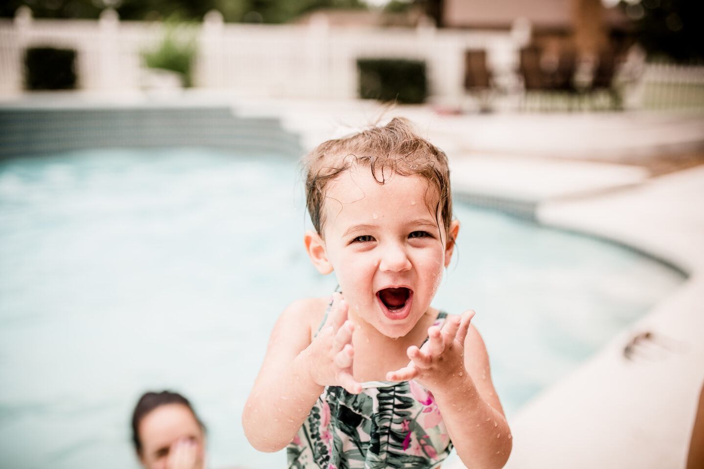 water safety tips: toddler excited at pool