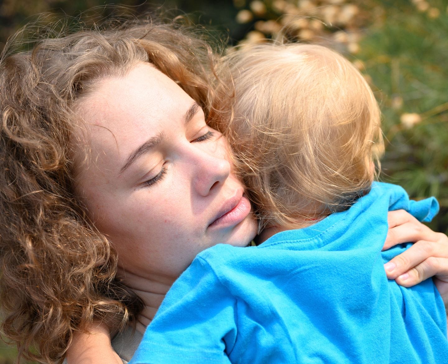 mother comforting child