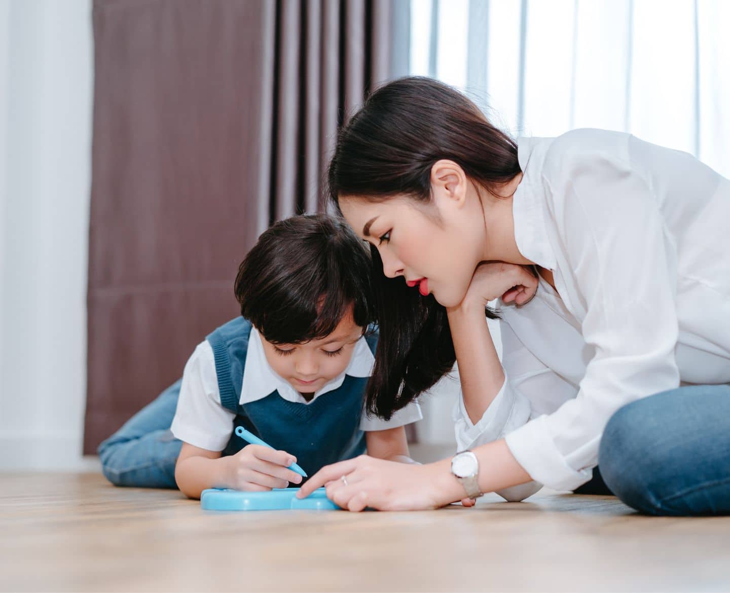 mom helping son with homework