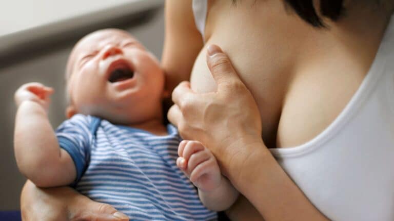 Breastfeeding mom and crying baby