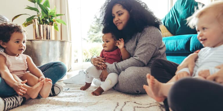 group of moms with their kids, because a safety net is what moms need