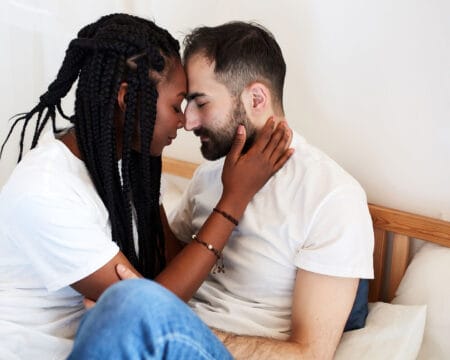 couple hugging on the bed Motherly