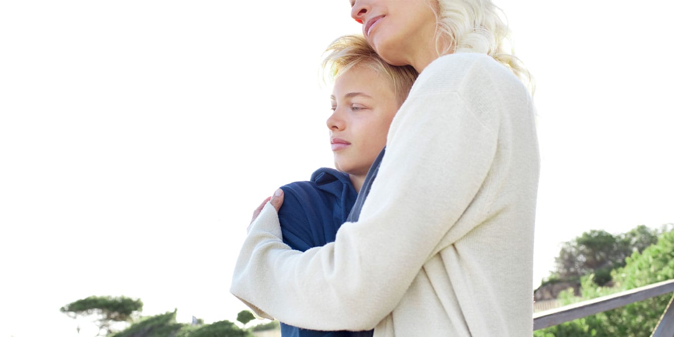 mom comforting son - letting your teenager make mistakes