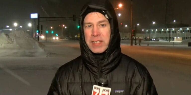 news guy reporting during a blizzard- sports reporter's cranky broadcast