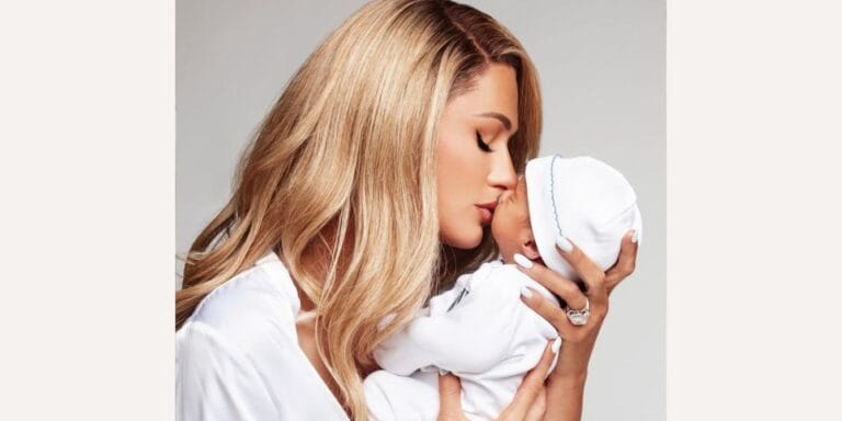 Paris Hilton kissing her baby