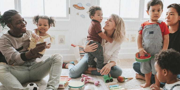 diverse children enjoying playing toys - raising inclusive kids