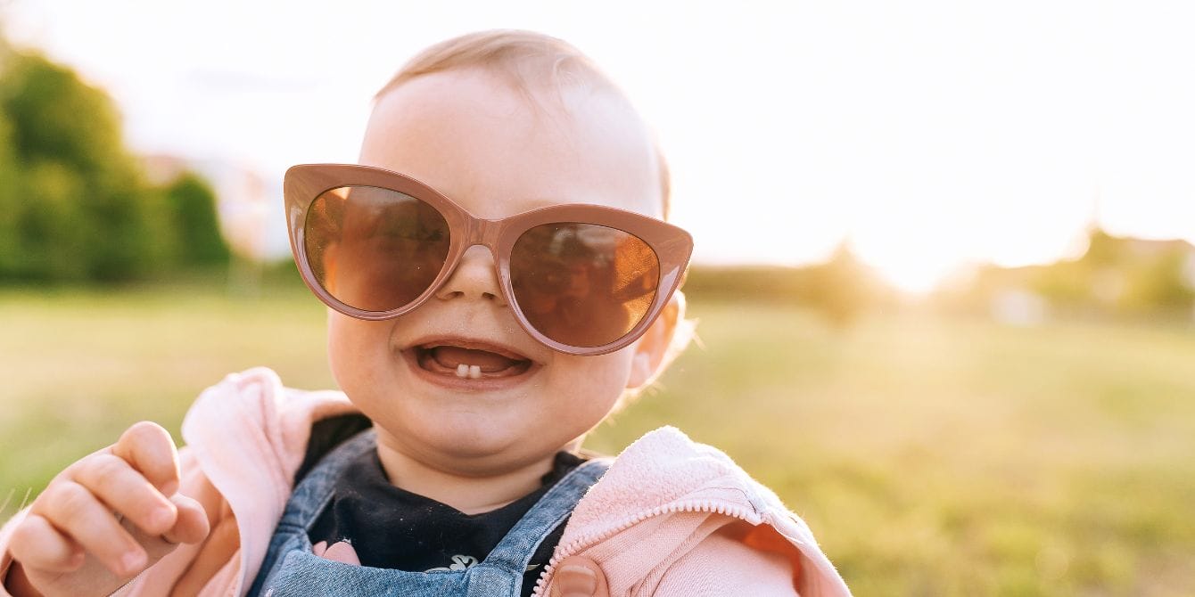 baby wearing moms indestructible sunglasses