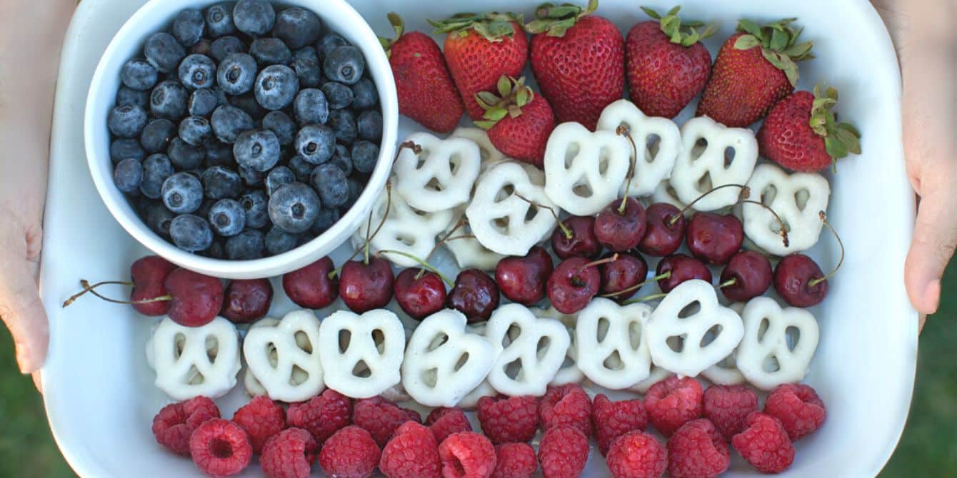 strawberrries, blueberrries, and pretzels snack tray- red white and blue foods