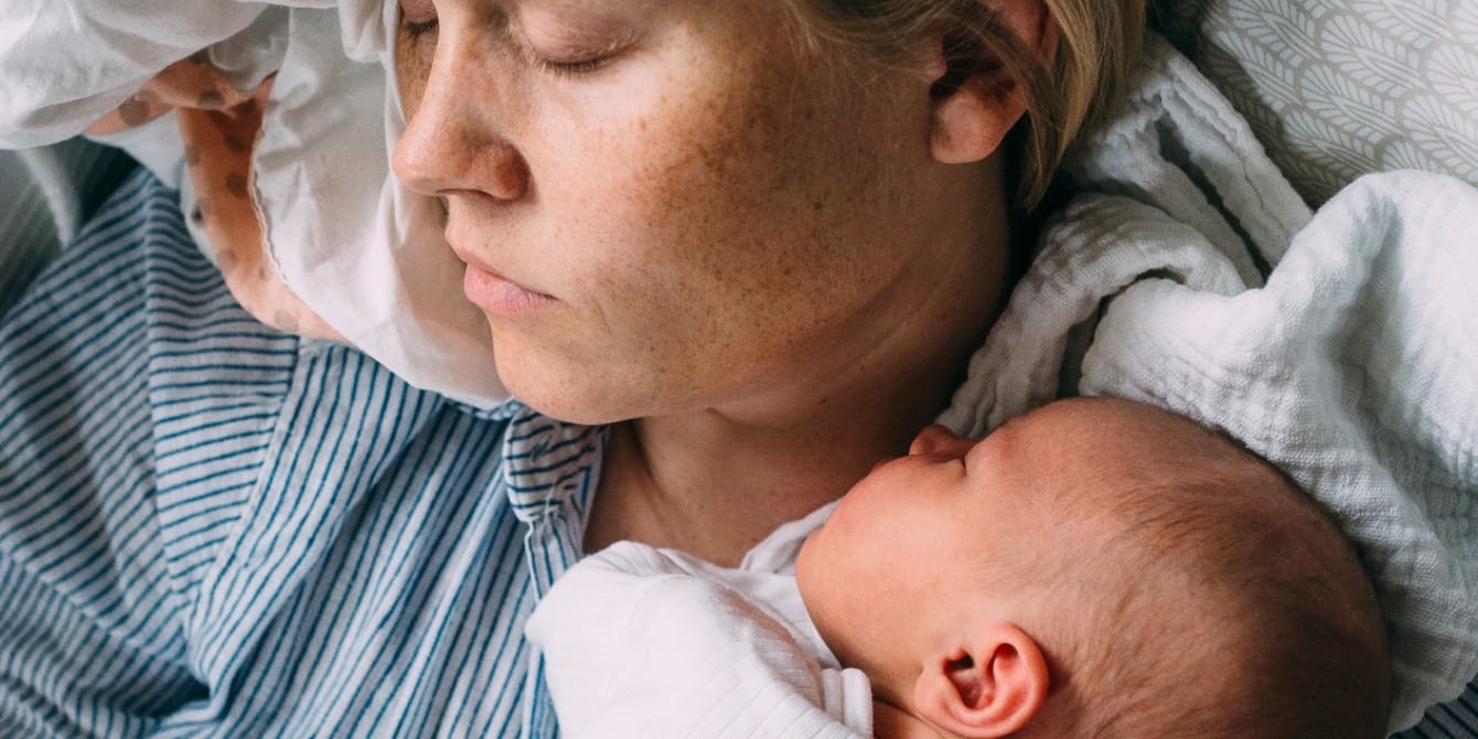 Mom and newborn baby sleeping - Are you in the messy middle of motherhood?