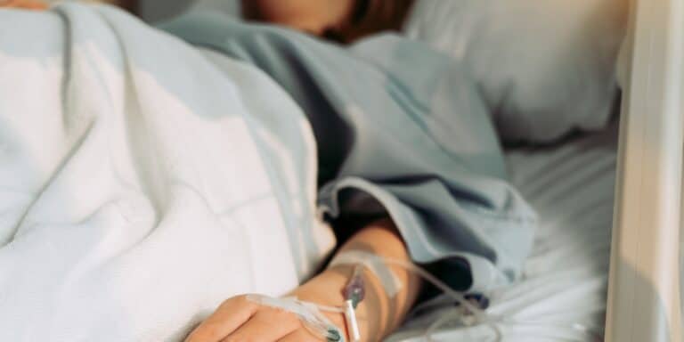 woman in hospital bed - Test to predict preeclampsia receives FDA approval