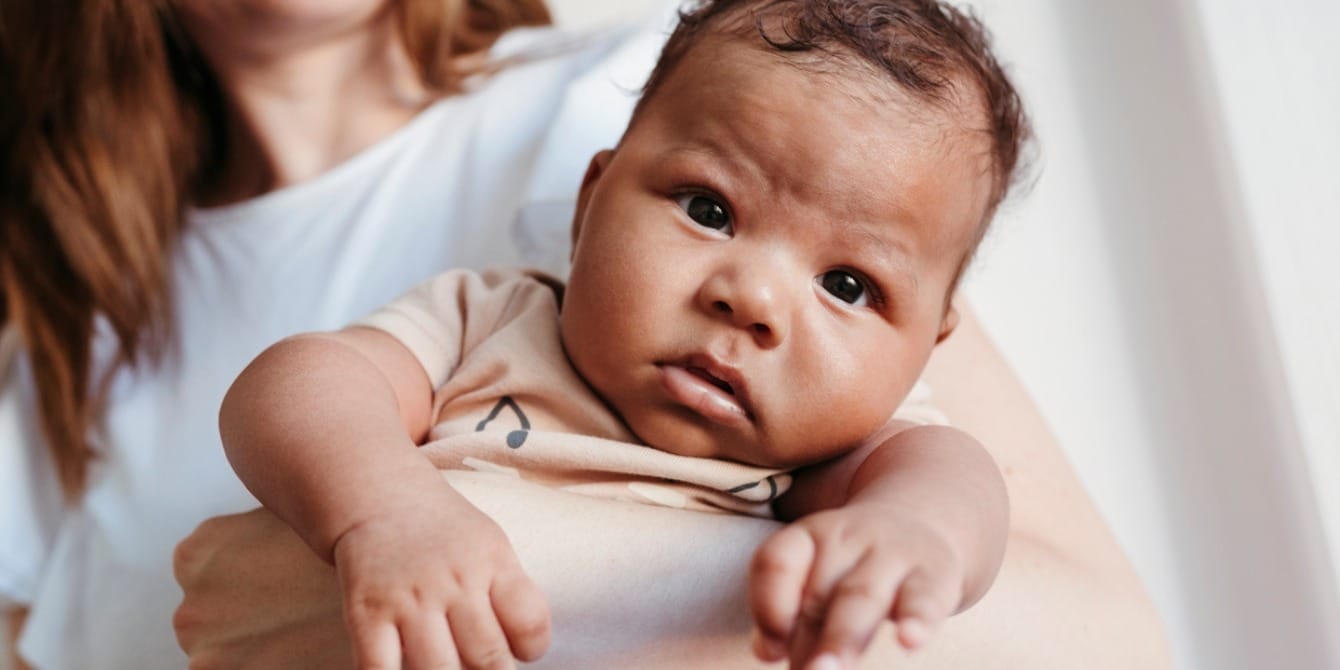 baby boy in his mother's arms- boy names