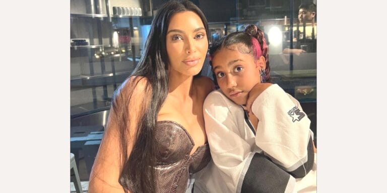 Kim Kardashian poses with North West