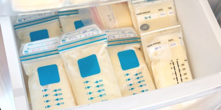 bags of frozen breastmilk in freezer - share the drop app