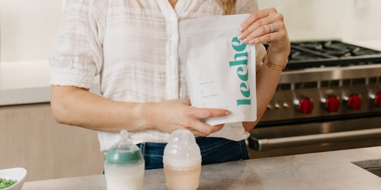 woman holding bag of freeze-dried breast milk