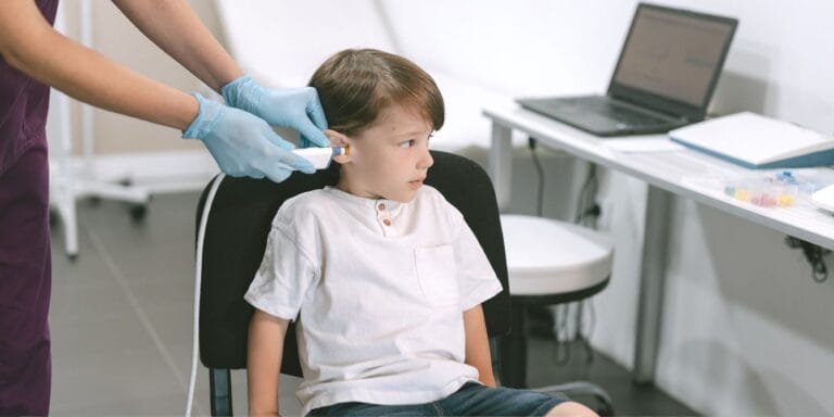 Child getting a hearing exam