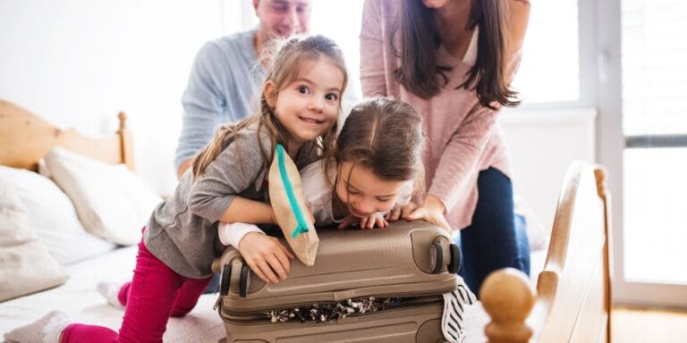 family packing for trip- thanksgiving travel with kids