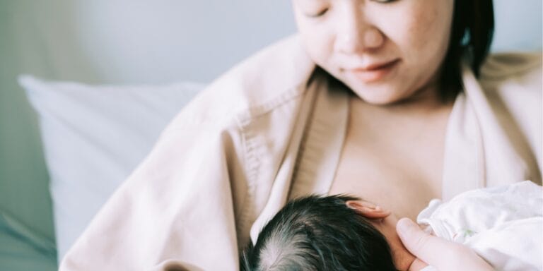 postpartum mother feeding baby paid family leave health benefits