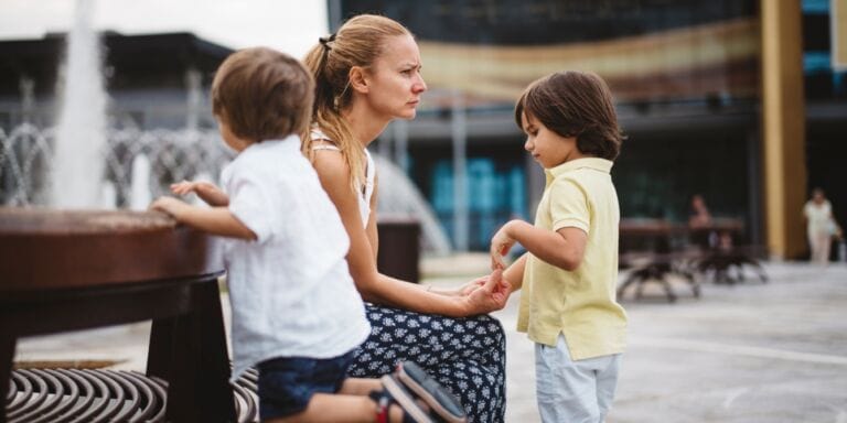 mom outside with two kids anger nervous system