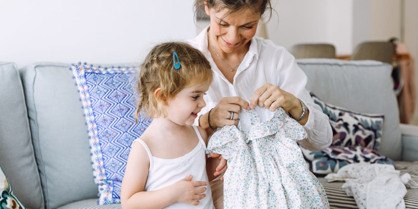 mother and young daughter at home