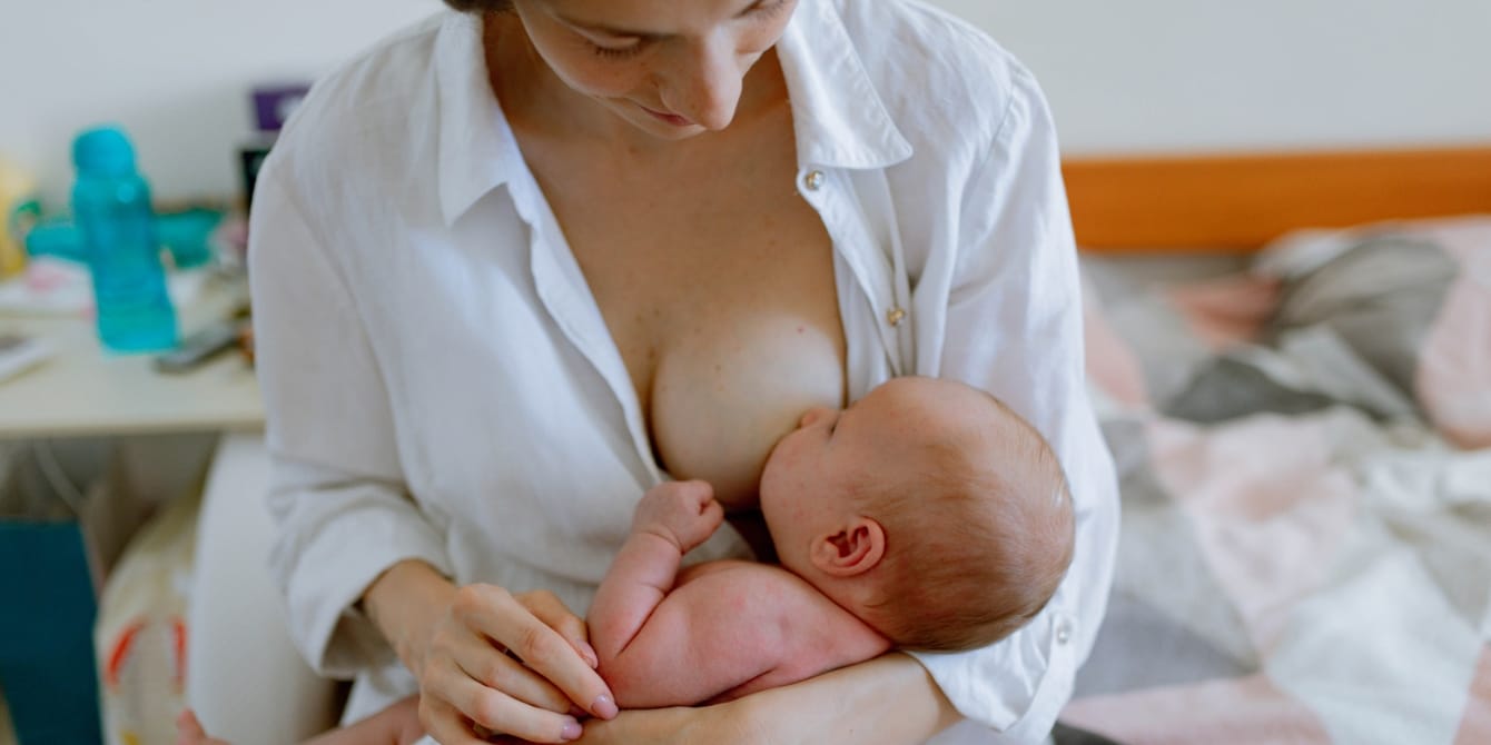 mother breastfeeding her baby