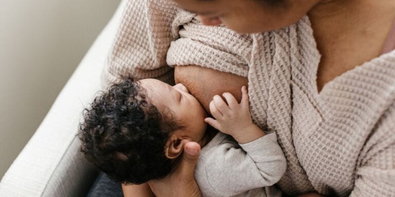 mother breastfeeding her infant