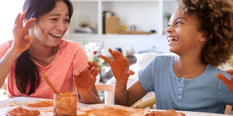 two girls having playdate and using art supplies - charging expenses for playdate