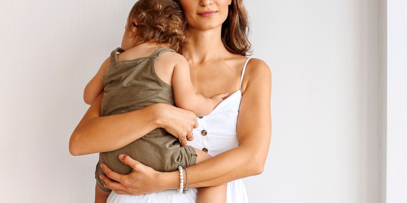 mother holding child close up - recovered from postpartum psychosis ppp