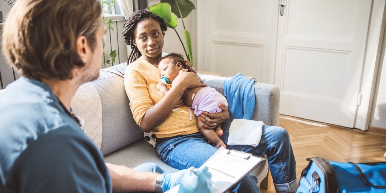 Mom and baby with home nurse