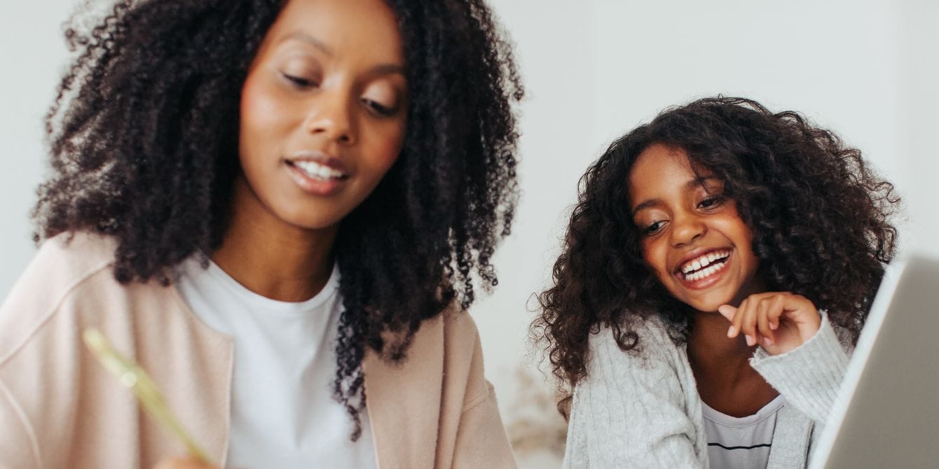 mother and daughter talking - closing investing gender gap