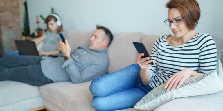 parents on phone Motherly