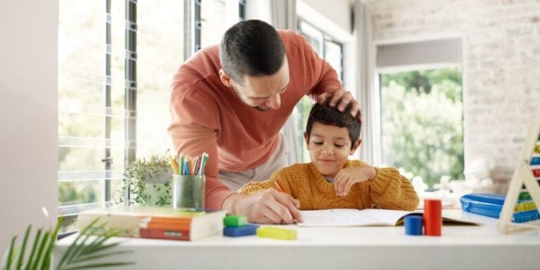 Dad helping son with homework