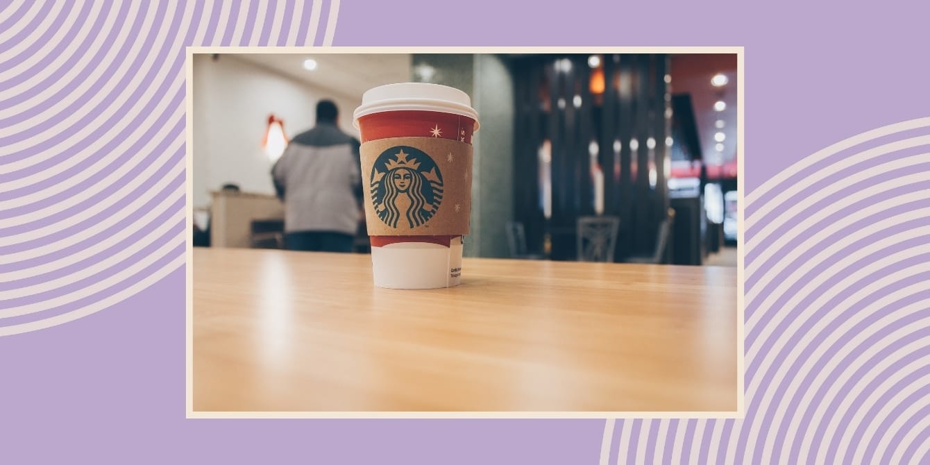 A Christmas Starbucks coffee cop on a table